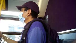 Person Watching on a Q32 Bus to Manhattan