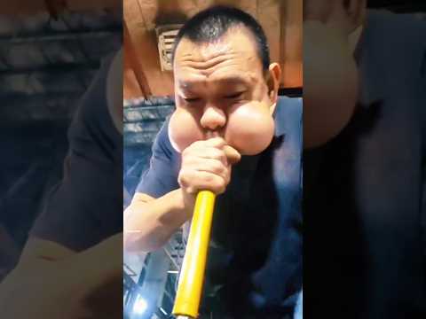 كيف ي شكل الزجاج عن طريق النفخ