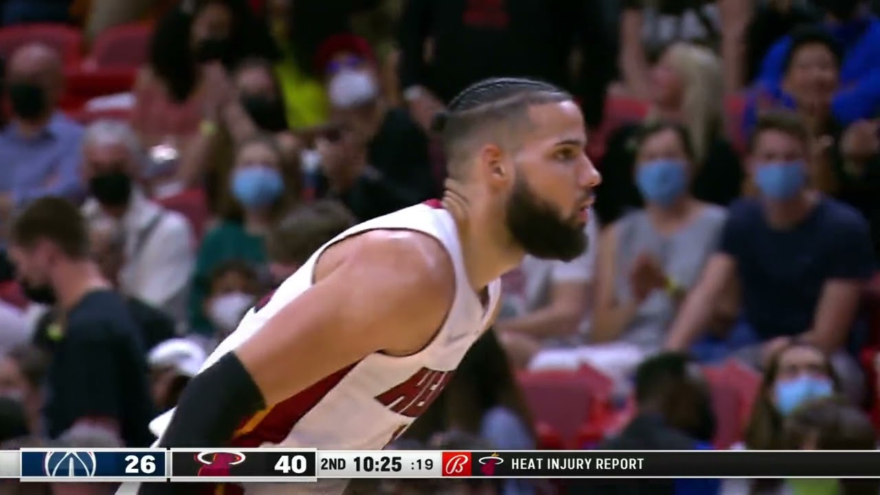 Caleb Martin dunks over and around Washington Defense