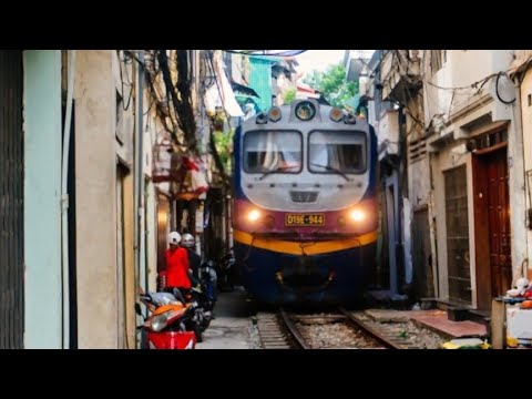 "World&rsquo;s most dangerous" railtrack near house in Hanoi, Vietnam - train street Hanoi - shockwave