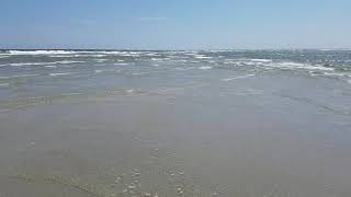 Low tide Ocean Isle beach, NC where two parts merge