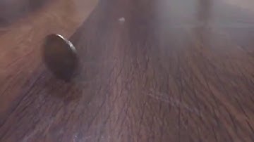 Spinning coin in slow motion by iPhone 6 camera