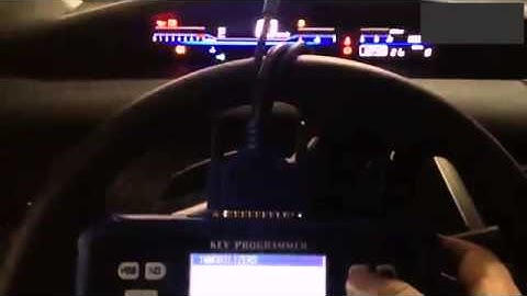 Program 2014 Honda remote key by using SKP 900 key programmer
