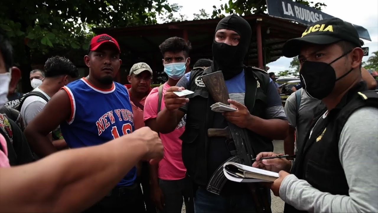 Many in migrant caravan bused back to Honduran border