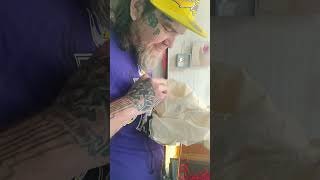 Reticulated python unboxing part1 this is the male he is purple albino double het anery/pied