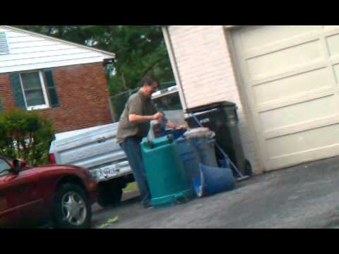 My dad destroying a trash can