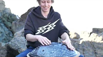 Playing the hand pan at the beach