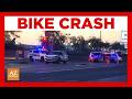 Bike, SUV crash closes road near Sky Harbor Airport