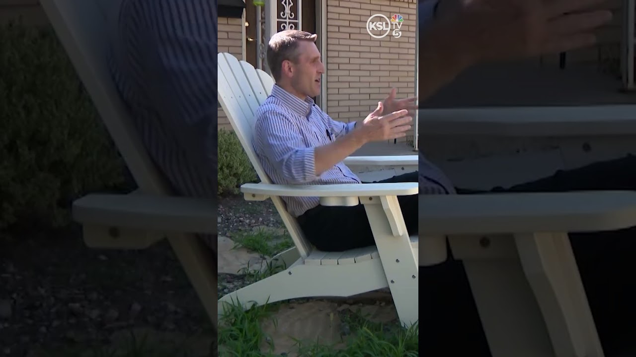 Utah homeowner battles a fire with his hose