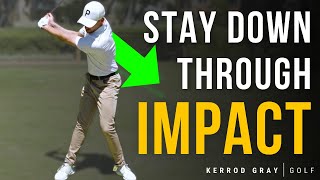 How to Stay Down Through Impact in The Golf Swing