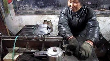 Paint roller frame handle machine