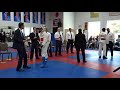 Grand Championship: Black Belt fight 3 (my student Ben white helmet)