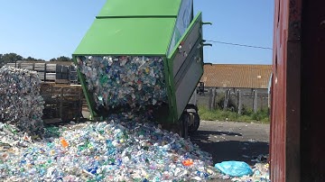 Portable compactor tipping 15,000 PET bottles