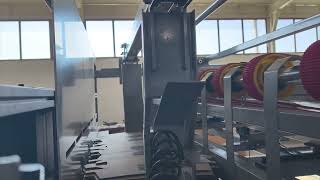 XINYU XY-V full vacuum transfer printing slotting die-cutting machine with automatic stacker.