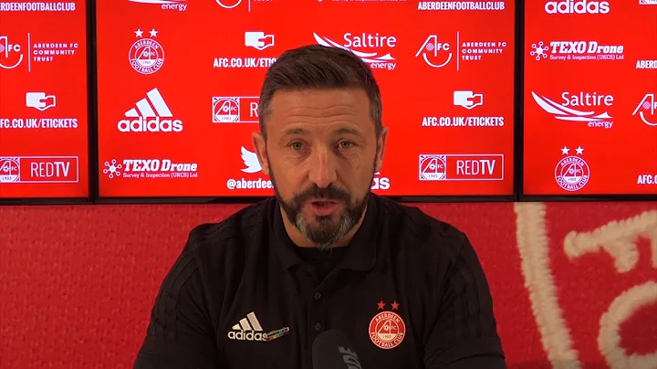 Derek McInnes congratulates Douglas Rae on his ind...
