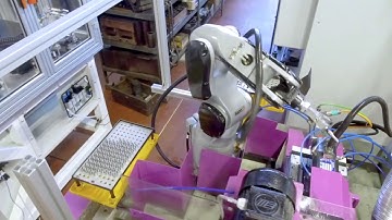 COMAU Racer-3-0.63 in machine tending application - FIRAD