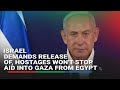Israel demands release of hostages, won&#39;t stop aid into Gaza from Egypt