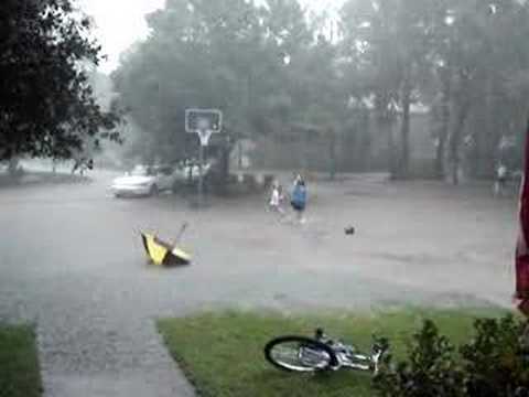 October 15 & 16, 2006 Friendswood Texas recieved 8 inches of rain in 48 hours. The streets flooded and so did a few houses. This video shows my kids and the neighbor kids playing in the flooded street. I took the video from my front porch.