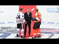 Dominik hasek drops puck at global series