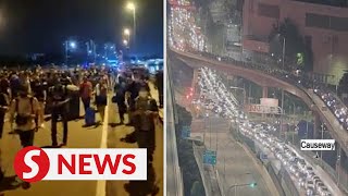 Sheer delight, relief as border reopens at Johor Causeway, Linkedua screenshot 2