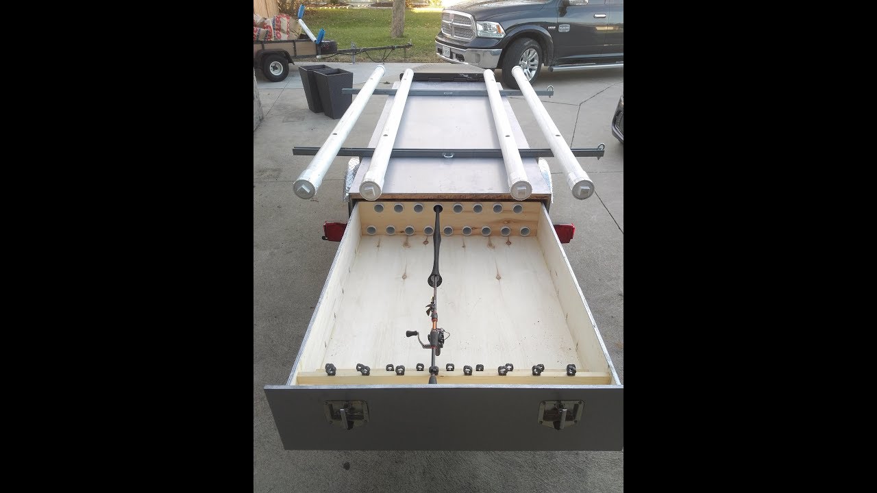 Kayak trailer with rod locker storage 