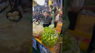 A glass of cold, sweet and cold milk, 5000 Riel, for sale on the river in Phnom Penh