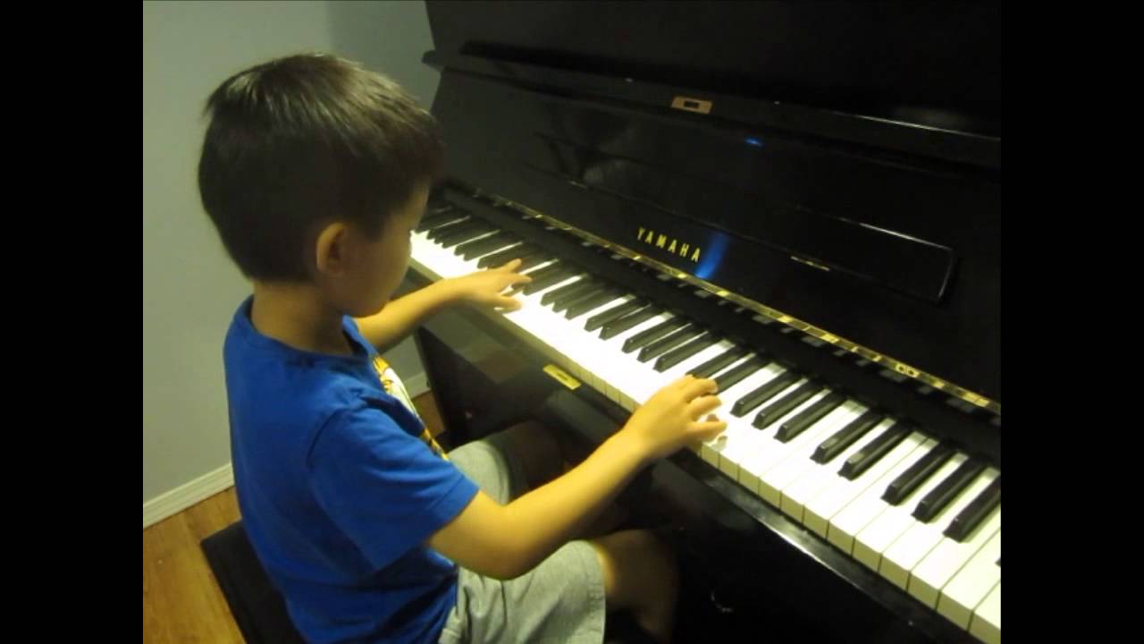 Alex (6) plays piano RCM Grade 5 Scamp by Christopher Norton