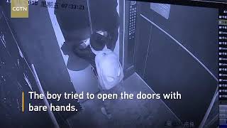 Boy uses umbrella to prevent elevator door from closing causes free fall caught on cam