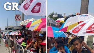 Calor, desfile y la propaganda en Puebla