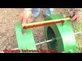 Transplanter with water wheel on mulch film with Rain-Flo 1600 | Dubois Agrinovation