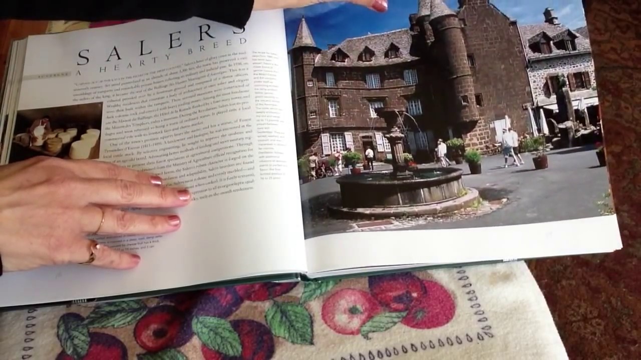 ASMR: Slow page flip, glossy book; inaudible whisper