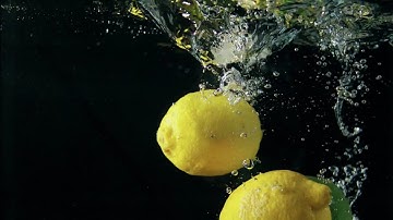 Slow motion lemon in water 4k