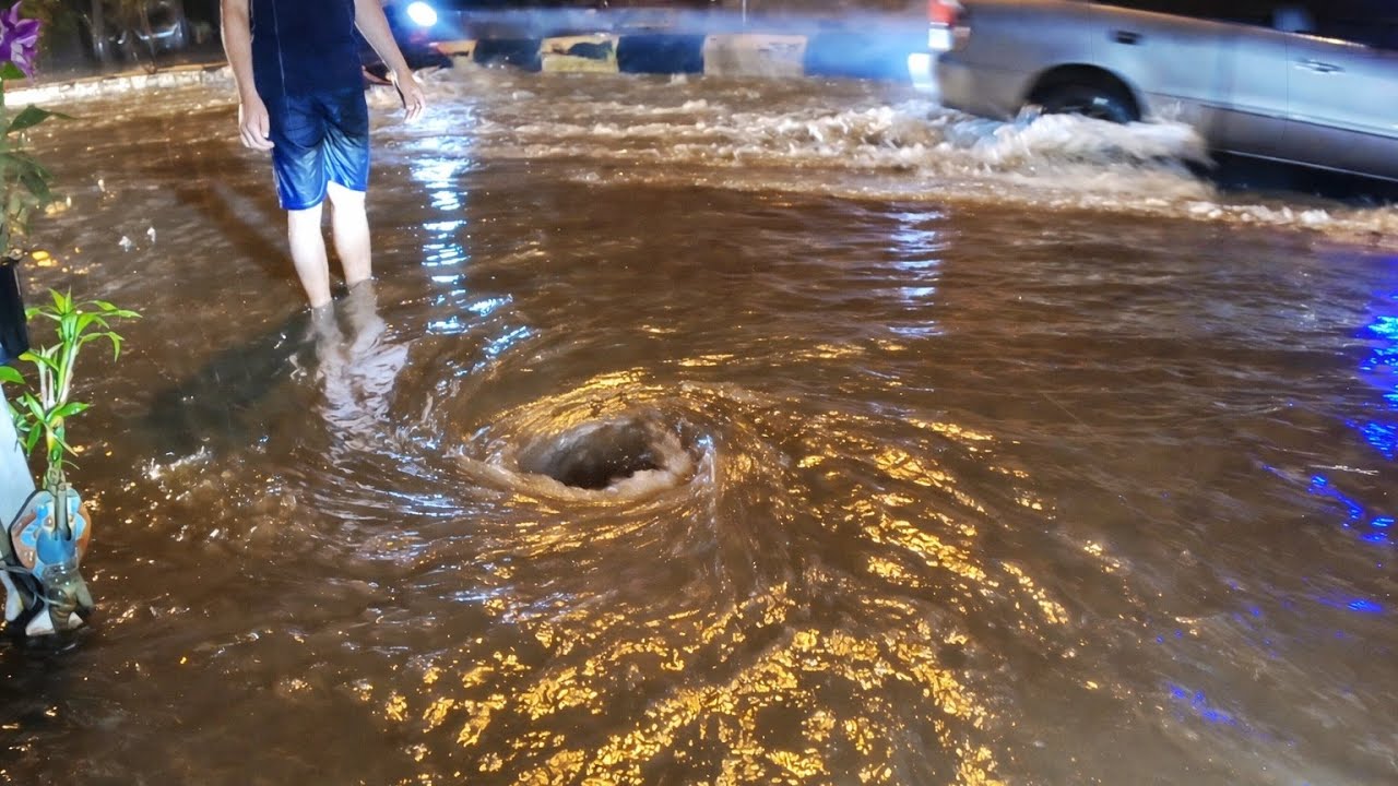 After heavy rains, water blocked the drains and flooded the roads