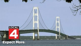 Man clings to moving car in attempted carjacking after police chase across Mackinac Bridge
