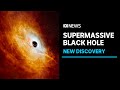Scientists discover fastest-growing supermassive black hole | ABC News