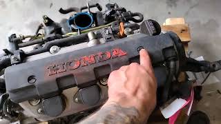 how to replace ignition coils and spark plugs on a Honda 1.7l engine