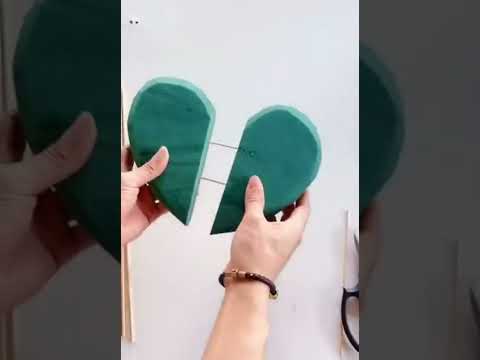 تنسيق باقة ورد على شكل قلب