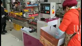 Upward film pillow machine for dried persimmon with tray package 上走膜枕式机 包柿饼 带托盒