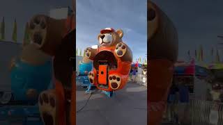 Riding the dizzy bears at a carnival