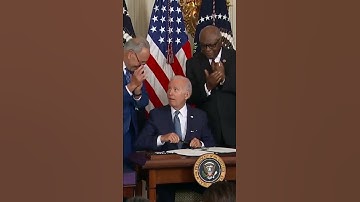 #Biden Signs Inflation Reduction Act, Gives Manchin Pen