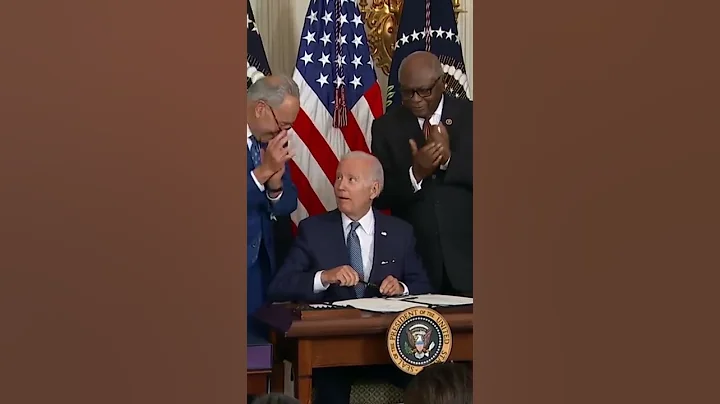 #Biden Signs Inflation Reduction Act, Gives Manchin Pen