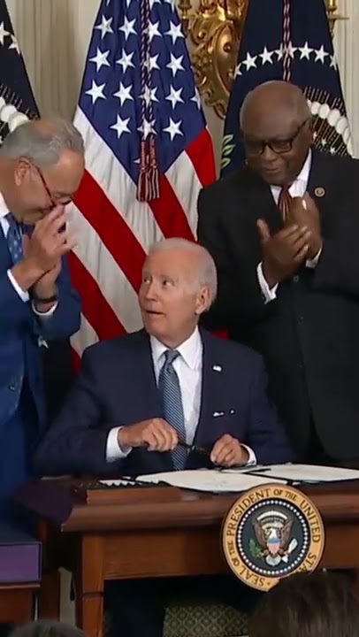 #Biden Signs Inflation Reduction Act, Gives Manchin Pen