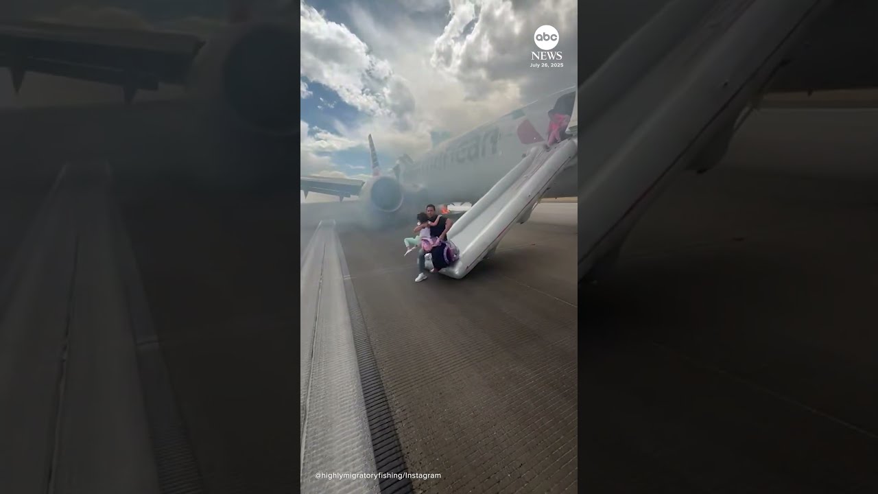 Passengers Exit Plane Via Emergency Slide After Aborted Takeoff