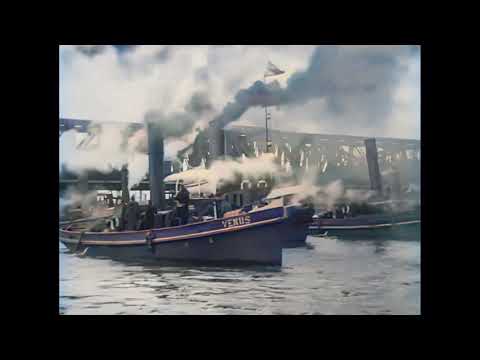 Rotterdam: Tewaterlating en onder de Maasbruggen doorslepen van 8000 ton Droogdok in 1923 in kleur!