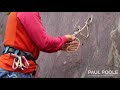 Building a climbing belay with a sling to 2 anchor points
