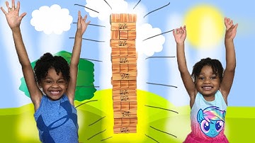 GIANT JENGA XL Cardboard Block Game for Kids with Eggs Surprise Toy | Naiah & Elli Toys Show