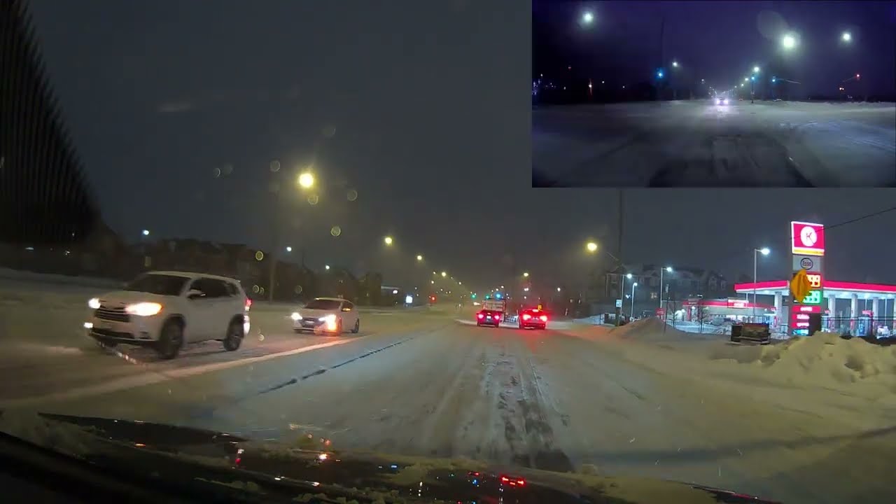 driving in snow blizzard on slippery road  