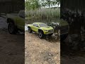 🚗 Kyosho Toyota Tacoma driving through water and rocky terrain | RC offroad adventure