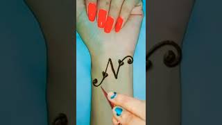 NLetter mehandi designe .tattoo.