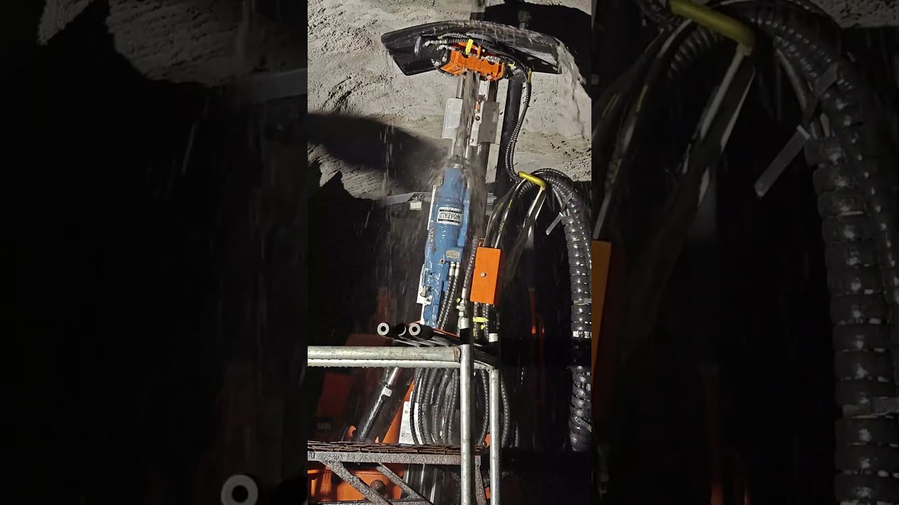 Woserld hydraulic rock drill mounted on a long hole drilling rig